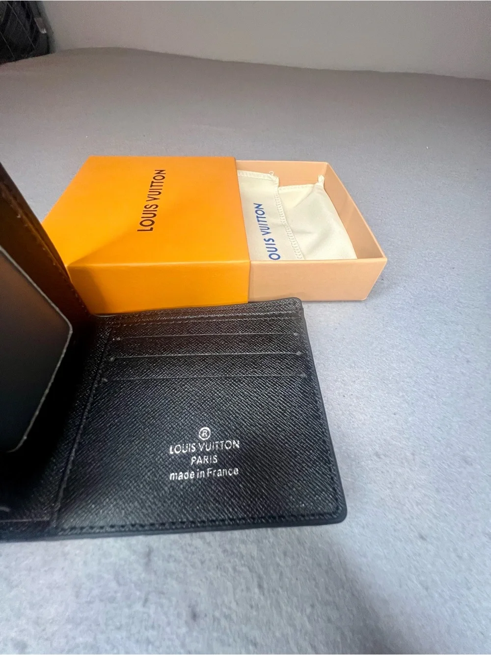 Louis Vuitton Black Embossed Monogram Men's Bi-Fold Wallet